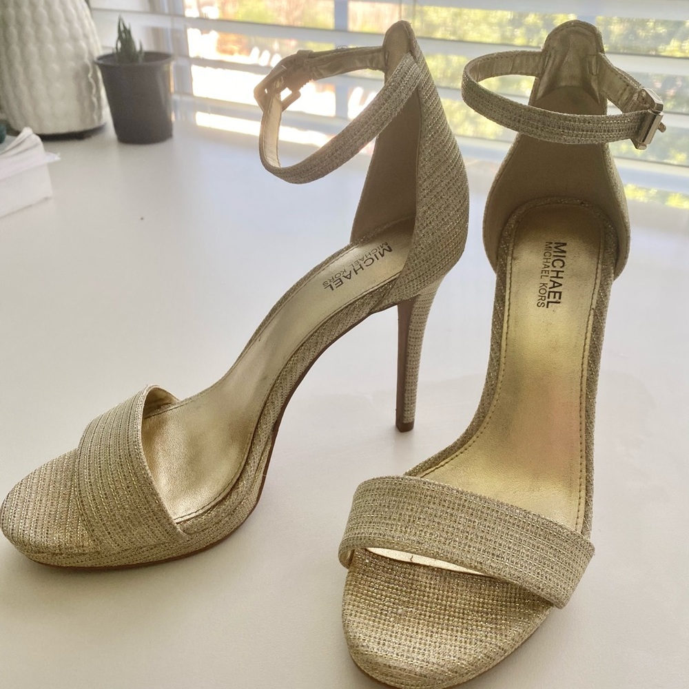 Michael Kors gold heels size 7! In perfect condition and only worn once!